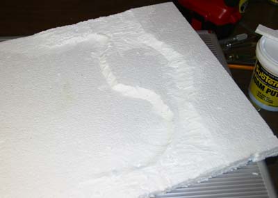 glued and puttied foam layers